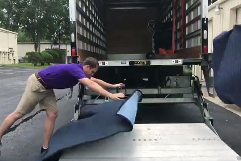 Laying floor protection at the truck
